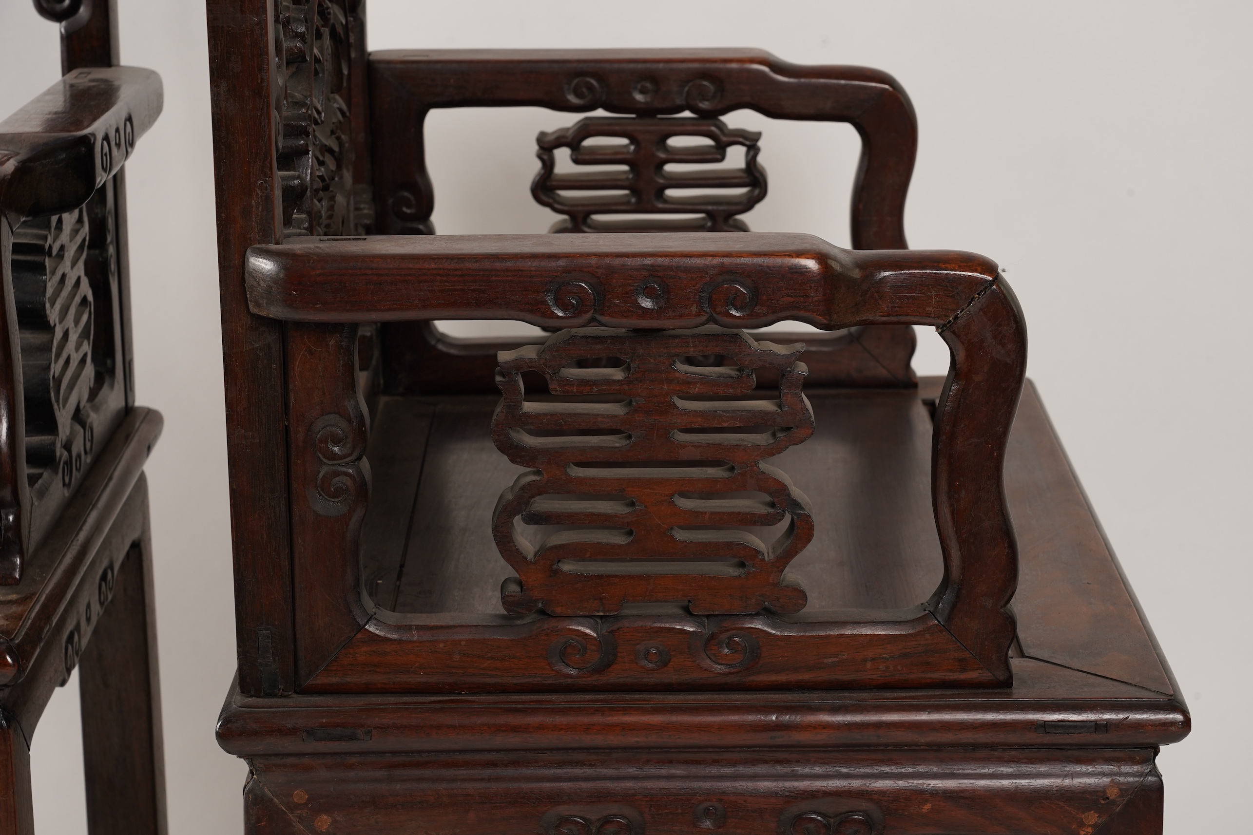 A pair of Chinese hongmu armchairs, late 19th century
